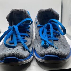 Nike Gray Sneakers with Blue Accents